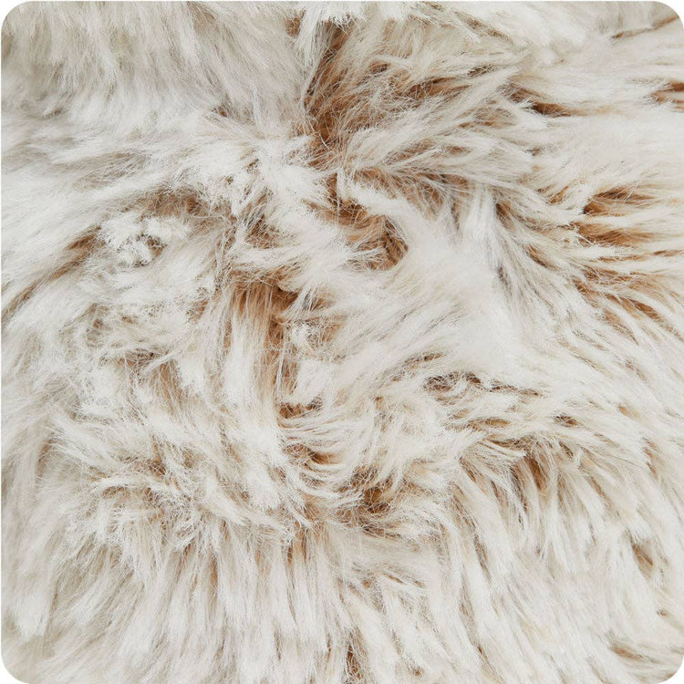 Close-up of soft, gently weighted Warmies Junior lavender-scented plush toy.