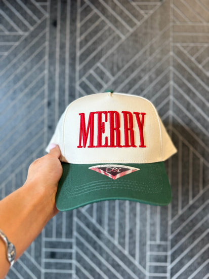 Close-up of bold 3D puff embroidery on a festive two-tone cotton baseball hat.