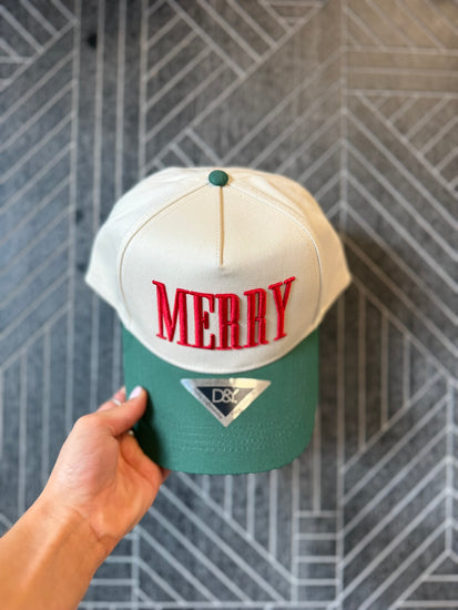 Two-tone Christmas baseball cap featuring raised 3D puff embroidery and an adjustable snapback closure.